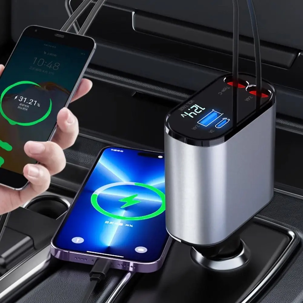 Fourfold Coil 120 retractable car charger plugged into a car's center-console socket, both cables pulled out and its two spare ports free