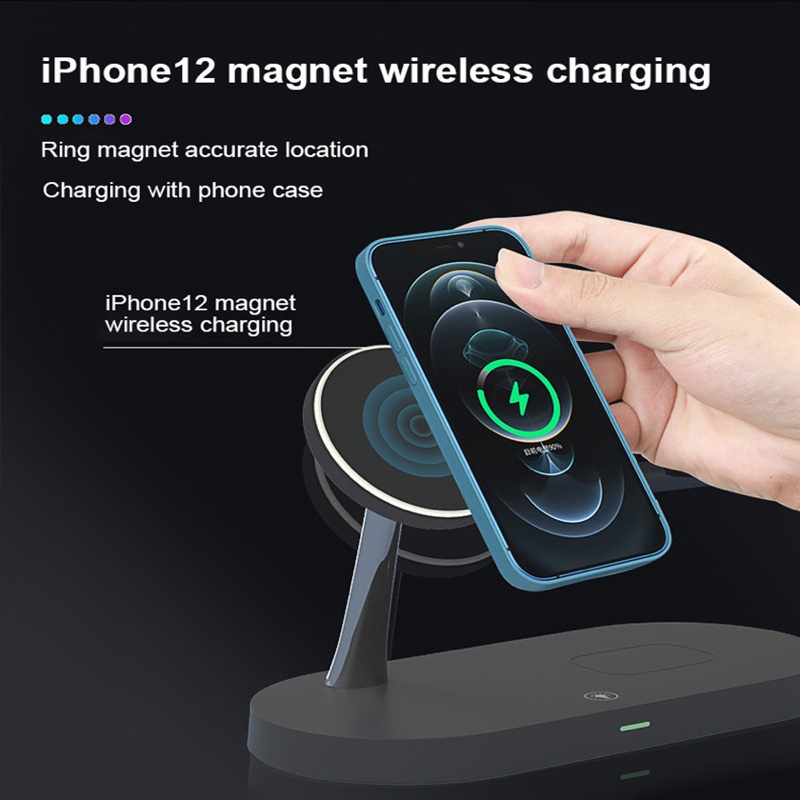 A hand placing a phone in a case onto the Fourfold Halo Dock's magnetic arm, which lines it up by its magnet ring